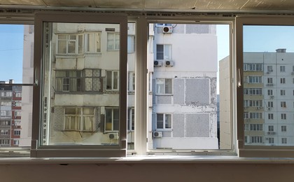Остекление балкона раздвижными окнами